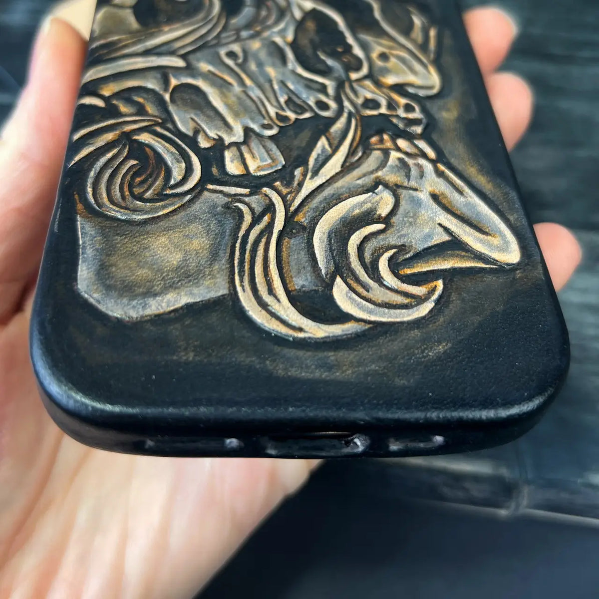 Hand-Carved Leather iPhone 15 Case: Embossed Skull Art