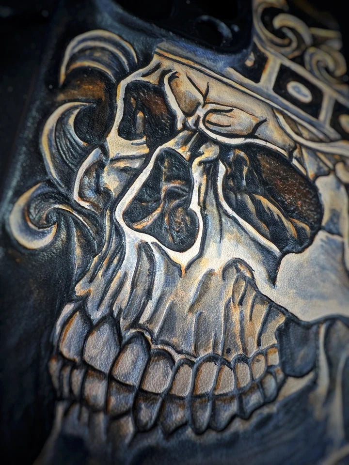 Hand-Carved Leather iPhone 14 Pro Case: Embossed Skull Art