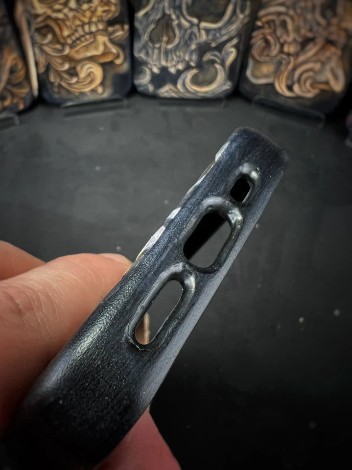 Hand-Carved Leather iPhone 14 Pro Case: Embossed Skull Art