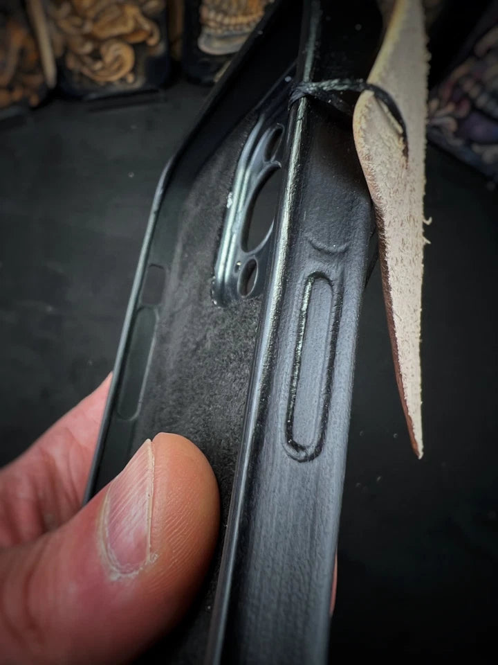 Hand-Carved Leather iPhone 14 Pro Max Case: Embossed Skull, Alcantara Interior